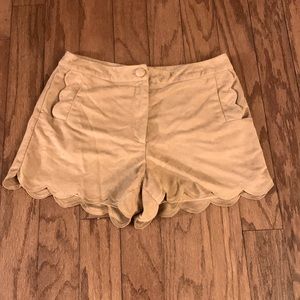 Suede look shorts lined w pockets and scalloped hem